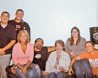 Here's a "group hug," sent in by Betsy Koneval of Youngstown. From left are Corey Fonner, friend Alden, Jill Fonner, Truck Toth, Betsy, Jenna Fonner and Megan Crosby. Betsy says they all love to spend time with family.