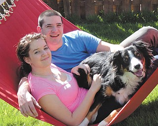 Joyce Howard of North Jackson sent in this photo of Benjamin A. Howard Jr. of Boardman and Heather Atkinson of East Palestine, who have been dating since July 2010. This photo, which includes Ben's Border Collie, Luke, was taken right before Ben left for the Navy.