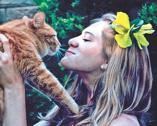 Leanna Hartsough, a Youngstown State University junior, and her cat Marshmallo. Photo submitted by Lana VanAuker of Canfield.