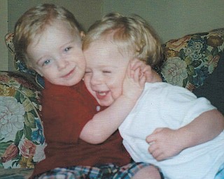 Twins Owen and Zachary Walker share some brotherly love. The boys are now 10, says their mom, Jennifer Walker, who sent in this photo.