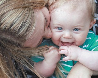 Baby Owen, 6 months, loves his mother, Shaina Holt. Photo is submitted by Joyce Buzzacco, and all are of Youngstown.