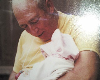 Youngstown native Bill ("Pappy") Clark holds his granddaughter Sommer in San Diego, Calif., on a visit in 1983. Photo sent in by Sherry Parent of Youngstown.