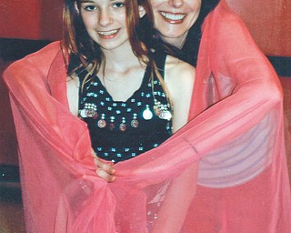 Karen Shneider and Renee Dashon pause at belly dance class at Judy Conti's Dance Studio. Photo sent in by Lana VanAuker of Canfield.