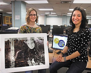 Catherine Brown, 19, left, and Ariana Ellis, 18, who both graduate from Canfield High School next month, are 2013 National Medal winners in the 90th Scholastic Art and Writing Awards. Brown won an American Visions Medal for her mixed media artwork, “Frightened,” and Ellis won a silver medal for each of her two writing submissions.