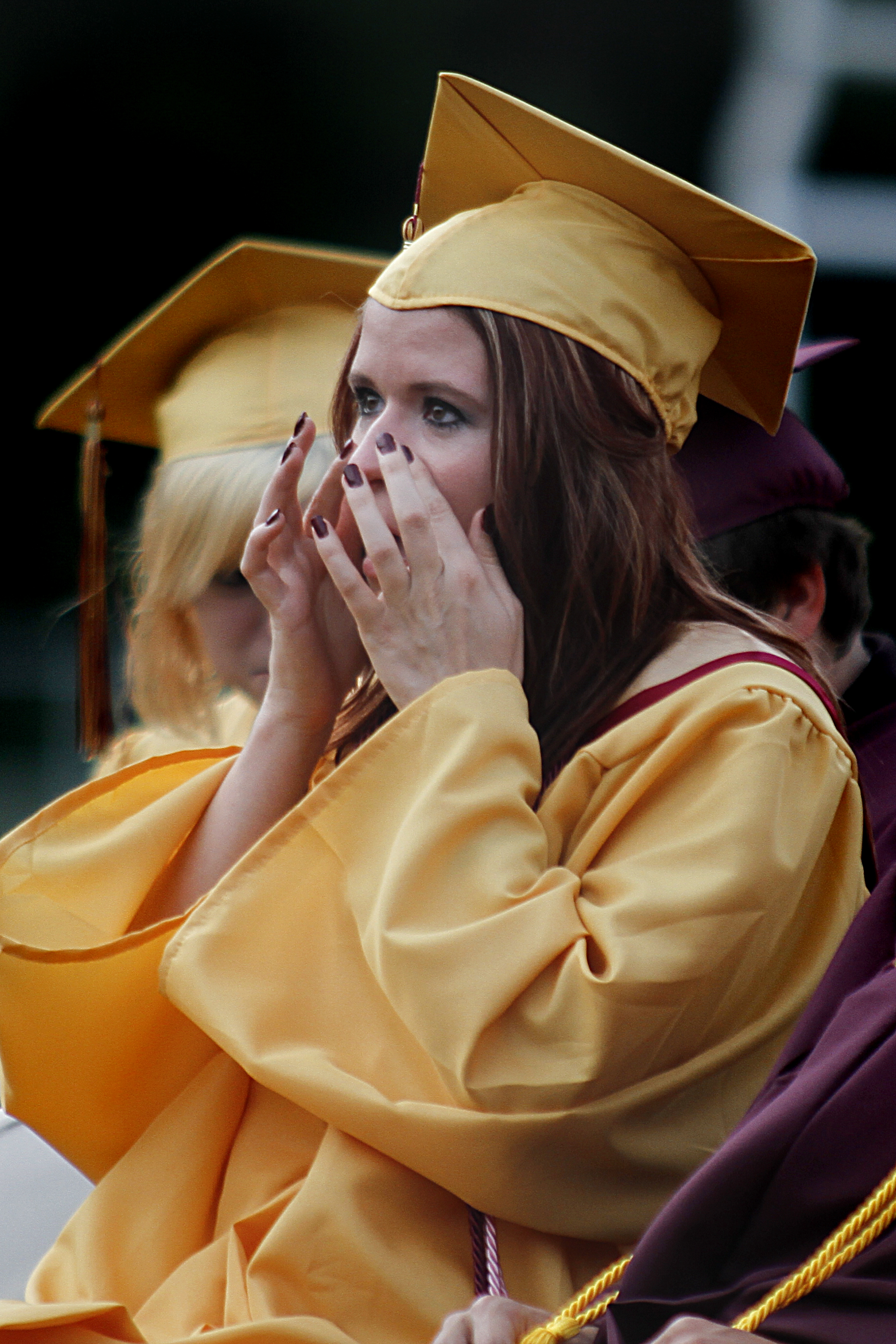 MADELYN P. HASTINGS | THE VINDICATOR

Brooklynn Kramer wipes away tears during Liberty High School's commencement.