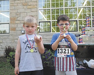 Vision for Veterans event features Toddler Trot
The Toddler Trot, for kids age 4 and under, was part of the Vision for Veterans 5K race that took place May 17 in Columbiana. The top three are, from left, above, Dylan Stoffer, 4, who finished second with a time of 24.60 seconds for the 100-yard measurement; and Shane Bacon, 4, whose time was 22.10 seconds; and below, Connor McNinch, 4, in third place, whose time was 25.30 seconds. 