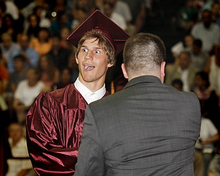 MADELYN P. HASTINGS | THE VINDICATOR
Andrew Zack reacts while receiving his diploma at Boardman High School's commencement on June 2, 2013.