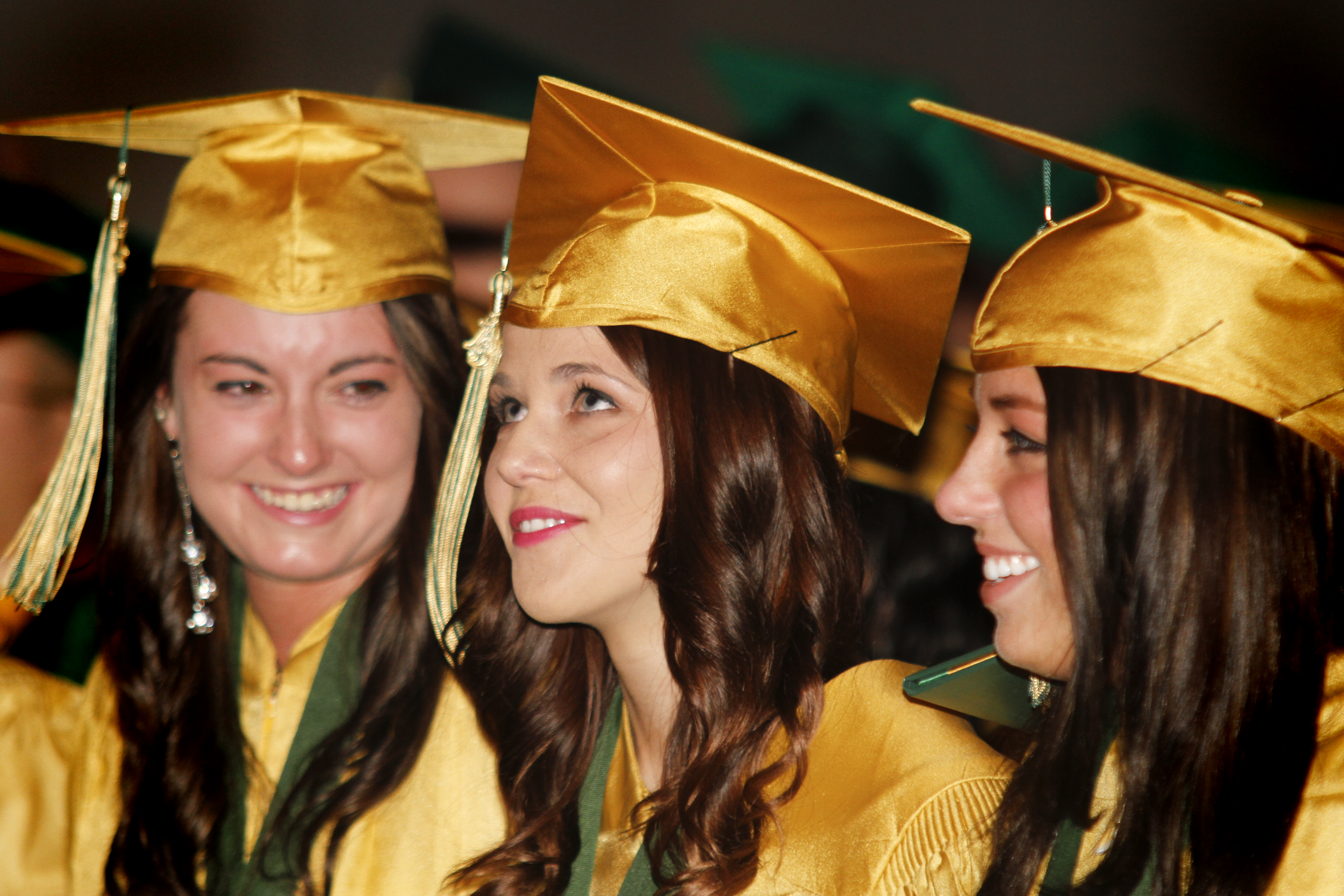 MADELYN P. HASTINGS | THE VINDICATOR

(L-R) Brooke Conlin, Sammantha Bonacci, and Katelyn Shells sing the alma mater during Ursuline High School's commencement on June 2, 2013 in Stambaugh Auditorium. 