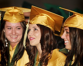 MADELYN P. HASTINGS | THE VINDICATOR
(L-R) Brooke Conlin, Sammantha Bonacci, and Katelyn Shells sing the alma mater during Ursuline High School's commencement on June 2, 2013 in Stambaugh Auditorium.