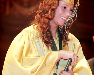 MADELYN P. HASTINGS | THE VINDICATOR
Molly Woodford walks across the stage after receiving her diploma during Ursuline High School's commencement on June 2, 2013 in Stambaugh Auditorium. Molly is a fourth generation graduate from Ursuline High School.