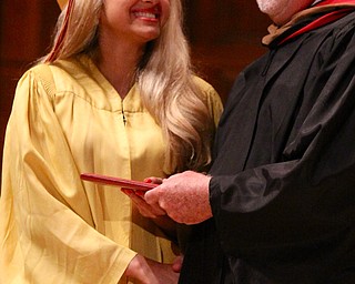  Sabrina Saadey smiles at Mooney principal John Young after receiving her diploma during commencement at Stambaugh Auditorium in Youngstown on Sunday.  Dustin Livesay  6/2/13  Youngstown. 