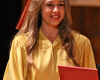 Shannon Saadey looks down at her diploma during the Cardinal Mooney commencement at Stambaugh Auditorium in Youngstown on Sunday.  Dustin Livesay  6/2/13  Youngstown. 