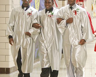 ROBERT K. YOSAY | THE VINDICATOR
The three together - asTimothy Sharp Malcomb McDuffie and Eliaja Washington get ready to line up for commencement
Chaney Campus High School Commencement Ceremony graduates 31