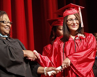 ROBERT K. YOSAY | THE VINDICATOR
Linda Cosma smiles as she receives her diploma from Diane Rollins Principal
Chaney Campus High School Commencement Ceremony graduates 31