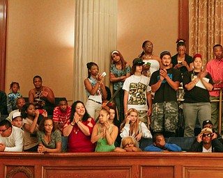 ROBERT K. YOSAY | THE VINDICATOR
Family and Freinds applaud
169 members of the East High School Class of 2013 who received their diplomas Thursday during the commencement ceremony at Stambaugh Auditorium.