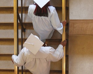 ROBERT K. YOSAY | THE VINDICATOR
East High Students climb the stairs as they enter the auditorium -
169 members of the East High School Class of 2013 who received their diplomas Thursday during the commencement ceremony at Stambaugh Auditorium.