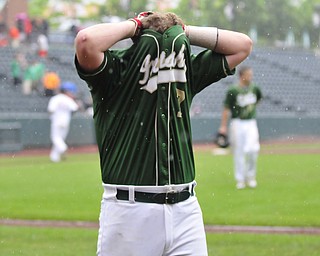 Harry Finelli #7 of Ursuline pulls his jersey up over his head after striking out with the bases loaded in the bottom of the 8th inning to end the game against Wheelersburg.
