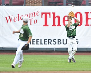 Ursuline outfielder #1 Tannor Berry prepares to catch a fly ball for the 3rd out to end the top of the 4th inning. Ursuline infielder #9 Joel Hake pictured. 