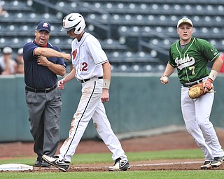 Ursuline third basemen #7 Harry Finelli prepares to throw the ball back to the pitcher after tagging out Wheelersbug base runner #12 Austin May who was trying to steal third base. 