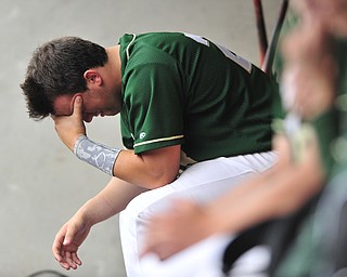 Michael Montallbano #23 of Ursuline reacts in the dugout after the first Wheelersburg run in the top of the 8th inning. 