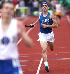 Maplewood's Mike Dahmen, right, runs to the finish during the OHSAA Boy's Division III State 4x800 relay Finals, Friday, June 7, 2013, at the Ohio State University, in Columbus, Ohio. (Photo For The Vindicator by Terry Gilliam)