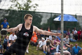 Austin Shivers competes in the discuss competition at the state track and field finals at Jesse Owens Memorial Stadium, Columbus, OH, Saturday, July 8, 2013.
