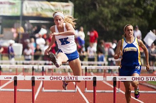 Morgan Rice competes in the 300m hurdles at the state track and field finals at Jesse Owens Memorial Stadium, Columbus, OH, Saturday, July 8, 2013.
