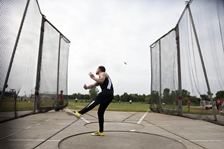 Austin Shivers competes in the discuss competition at the state track and field finals at Jesse Owens Memorial Stadium, Columbus, OH, Saturday, July 8, 2013.