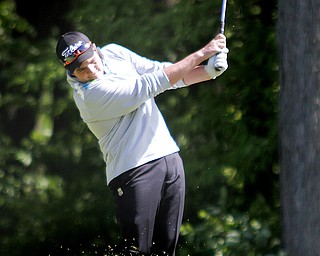 Greatest Golfer of the Valley junior qualifier, Donavan Ray, golfs at Pine Lakes Golf Club in Hubbard on May 25, 2013.