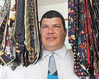 Dave Quigley of Youngstown has about 3,000 neckties in his collection, which all started with a Christmas-themed tie he bought at a Salvation Army store. In the past couple of weeks, he has worn baseball and basketball-themed ties, and this week, it’s a variety of themes.