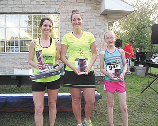 The Vision for Veterans 5K race May 17 in Columbiana posted 186 finishers in its sixth year. The top three females were, from left, Amanda Fire, first place; Anna Baltputnis, second; and Jenna Jacobson, third. Leading males were Justin Boggs, second; Scott Denham II, first; and Jonathan Bolha, third.