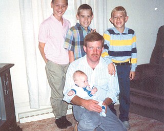 Larry Close of Beloit is in this 1992 picture with his four sons, Daniel, Shawn, Matthew and Adam. Photo was sent by Colleen Close.