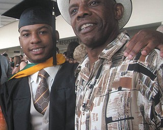 Lamont Stevens is a proud father at his son L.J.'s graduation on May 19 from Mercyhurst University in Erie , Pa. Both live in Youngstown.