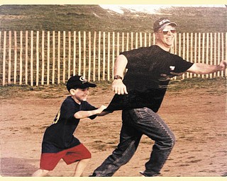 Skip Wert and his son Jared are playing around on the property in front of the Washington Monument in D.C., where they were doing some construction work.