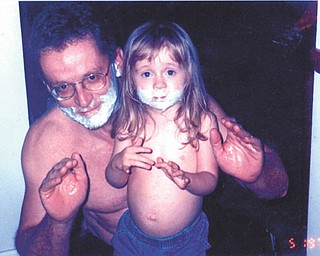 Ron Lowe had the perfect explanation when his daughter, Haley, who was 4 at the time, was curious about her dad's shaving ritual. Ron's wife, Cheryl, submitted the photo. All are of Boardman.