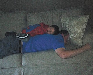 Brandon Polish and his son Logan are shown after a hard afternoon of play. Both live in Austintown.