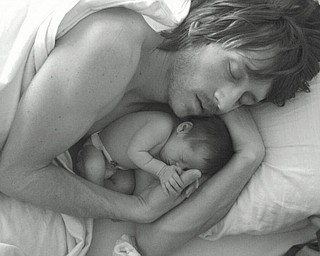 Brian Lapp and his daughter Cecilia are sound asleep.