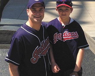 Dan Ricchiuti and his son Luca, both of Canfield, are all geared up to root for their favorite team.