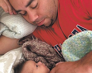 Newborn Nico Rogers (born on Mother's Day) and his dad, Justin Rogers, already have their own "mutual admiration society" going on, says Rita Minghetti, who sent this photo. The guys live in Boardman.