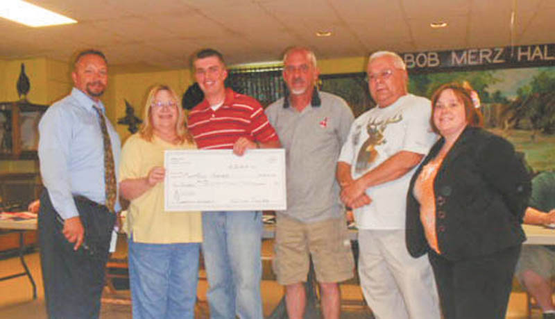 SPECIAL TO THE VINDICATOR
Lowellville Rod and Gun Club, 6225 Quarry Road, presented Matthew Horner with a check for $500 to use for his studies in environmental protection at West Virginia University. From left are Mark Cole, president; Clair Kopcsos, vice president; Horner, the recipient; Gary Horner, his father; John Kopcsos, treasurer; and Alisha Kopcsos, secretary. The club will be open for a free tour, fun and food, at 6 p.m. Wednesday and at 6:30 p.m. July 3. It also is taking applications for membership. For information call 330-536-8143.