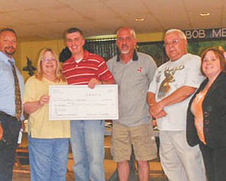 SPECIAL TO THE VINDICATOR
Lowellville Rod and Gun Club, 6225 Quarry Road, presented Matthew Horner with a check for $500 to use for his studies in environmental protection at West Virginia University. From left are Mark Cole, president; Clair Kopcsos, vice president; Horner, the recipient; Gary Horner, his father; John Kopcsos, treasurer; and Alisha Kopcsos, secretary. The club will be open for a free tour, fun and food, at 6 p.m. Wednesday and at 6:30 p.m. July 3. It also is taking applications for membership. For information call 330-536-8143.