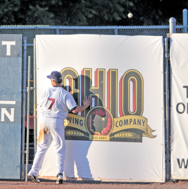 Scrappers outfielder Josh McAdams watches as a ball hit by the Jammers’ Jin-De Jhang goes over the wall for a home run in the fifth inning of Tuesday’s NYPL game at Eastwood Field in Niles. Jamestown shut out Mahoning Valley, 3-0.