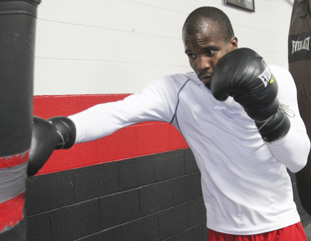 William D. Lewis\The Vindicator.Boxer Willie Nelson during a 6-19-13 workout at Southside Boxing Club in Youngstown.