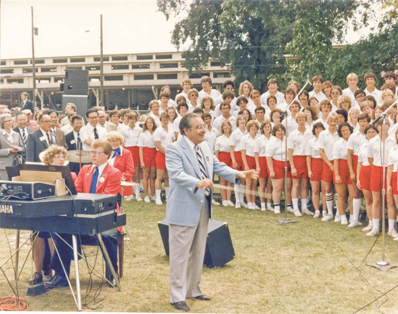 The late Glenville Thomas is shown directing the All-Ohio State Youth Choir during a performance at the Ohio State Fair for foreign visitors. The choir will reunite and sing at the fair this August to commemorate the 50th anniversary of the founding of the choir by the former Zanesville music director. Special to The Vindicator