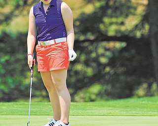 Kerra Loomis of Canfield watches her ball lip out of the hole on the 18th green at Salem Golf Club.
