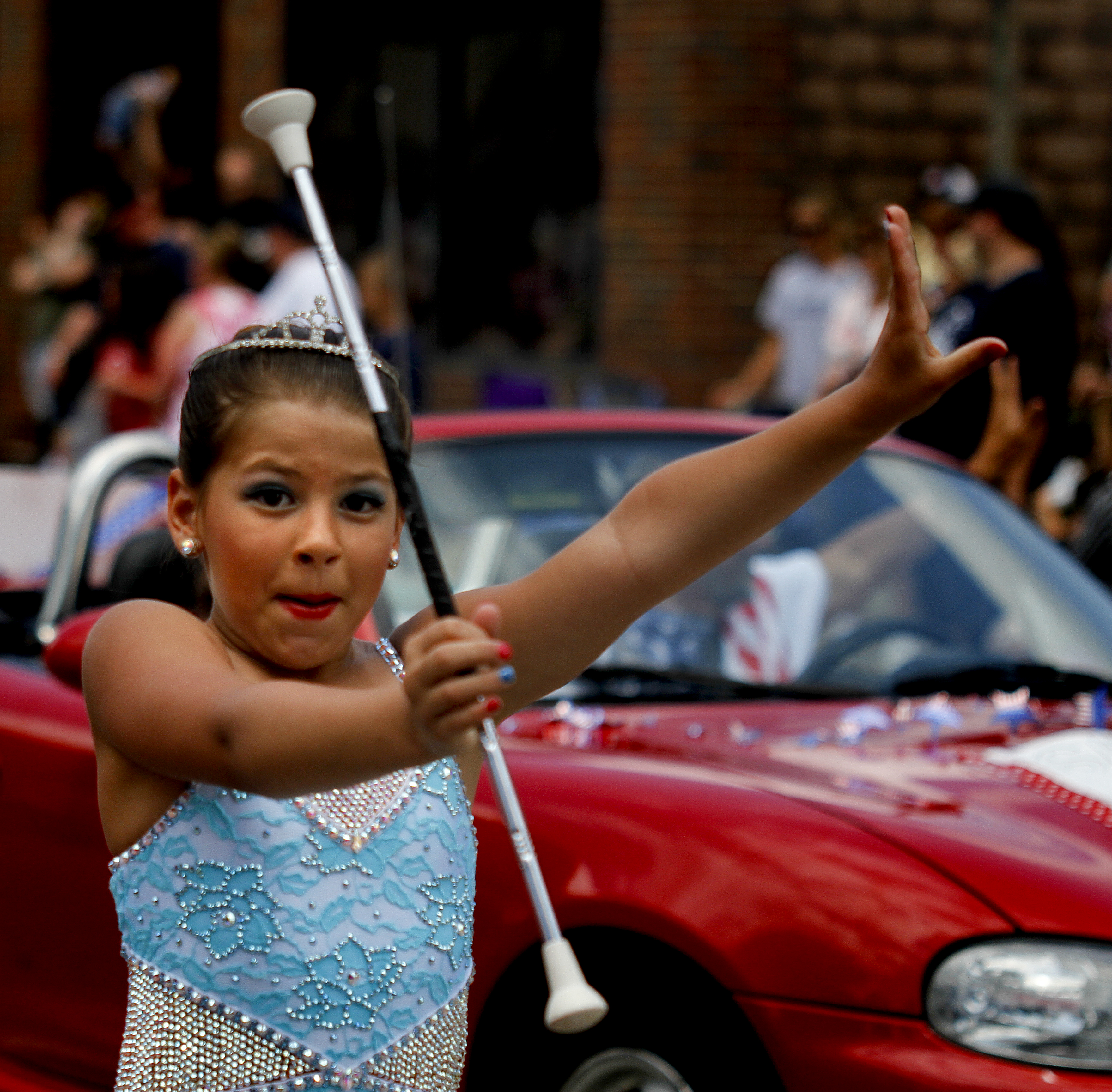 MADELYN P. HASTINGS | THE VINDICATOR

2013 Little Miss Majorette of Ohio, Isabella Rexroad performs during the parade at the hot dog festival in downtown Niles on Sunday.