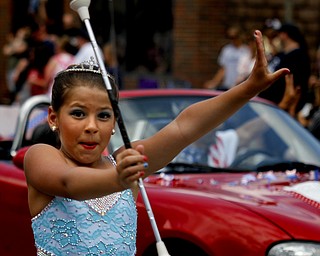 MADELYN P. HASTINGS | THE VINDICATOR

2013 Little Miss Majorette of Ohio, Isabella Rexroad performs during the parade at the hot dog festival in downtown Niles on Sunday.