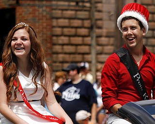 MADELYN P. HASTINGS | THE VINDICATOR

(L-R) Niles McKinley High School 2013 prom Queen and King Elizabeth Hess and Dominic Ficeti laugh during the parade at the hot dog festival in downtown Niles on Sunday.