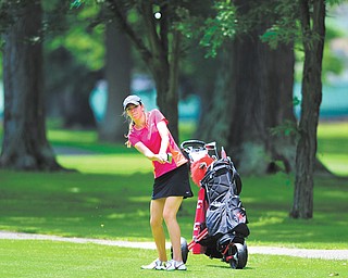 Bailey Hardick of Canfield follows through on her chip shot toward the green on the ninth hole at Tam O’Shanter Golf Course during a junior qualifier for the Greatest Golfer of the Valley, presented by Farmers National Bank.