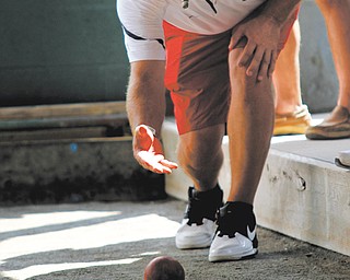 Nick DeCesare plays bocce during the benefit for Cardinal Mooney High School.